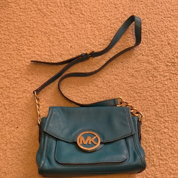 Michael Kors blue crossbody purse lightly used. Don’t really use it anymore. - Picture 1 of 3